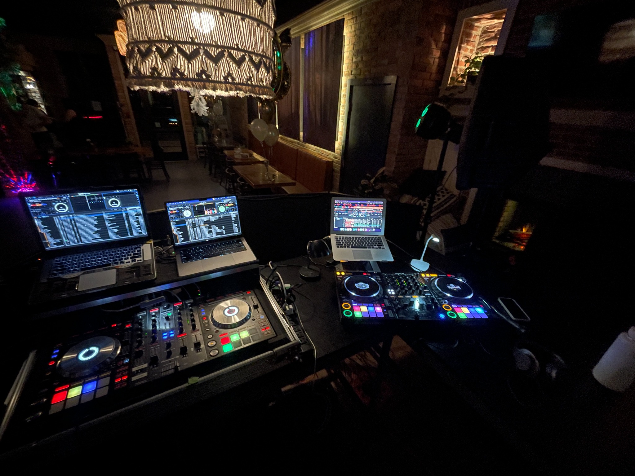 Professional DJ StereoMike setup with laptops and DJ controllers