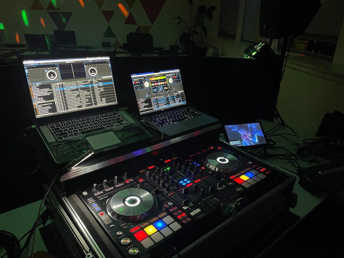 Professional DJ controller and nightclub-style event setup